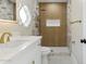 Updated bathroom with walk-in shower and white vanity at 9214 W Kerry Ln, Peoria, AZ 85382