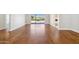 Hardwood floors and sliding doors leading to the backyard at 9214 W Kerry Ln, Peoria, AZ 85382