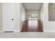 Bright living room featuring hardwood floors and sliding glass doors at 9214 W Kerry Ln, Peoria, AZ 85382