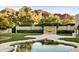 Landscaped backyard with fountain and mountain views at 6324 N 48Th Pl, Paradise Valley, AZ 85253