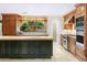 Spacious kitchen with island, stainless steel appliances, and wood cabinetry at 6324 N 48Th Pl, Paradise Valley, AZ 85253