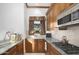 Charming kitchenette with granite countertops and gas range at 6324 N 48Th Pl, Paradise Valley, AZ 85253