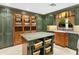 Laundry room with custom cabinetry, granite countertop and built-in storage at 6324 N 48Th Pl, Paradise Valley, AZ 85253