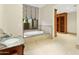 Bathroom with soaking tub, double vanity, and walk-in closet at 6324 N 48Th Pl, Paradise Valley, AZ 85253
