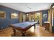 Game room with billiard table, hardwood floors, and French doors at 6324 N 48Th Pl, Paradise Valley, AZ 85253