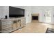 Living room with a fireplace and built-in entertainment center at 19820 N 13Th Ave # 226, Phoenix, AZ 85027