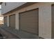 Exterior view of three attached garages at 19820 N 13Th Ave # 226, Phoenix, AZ 85027