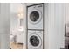 Stackable washer and dryer in a dedicated laundry room at 19820 N 13Th Ave # 226, Phoenix, AZ 85027