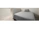 Bright bedroom featuring a double bed in a loft area at 19820 N 13Th Ave # 226, Phoenix, AZ 85027