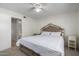 Comfortable bedroom with a queen-size bed and ensuite bathroom at 19820 N 13Th Ave # 226, Phoenix, AZ 85027