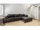 Living room featuring an L-shaped sofa and a spiral staircase at 19820 N 13Th Ave # 226, Phoenix, AZ 85027