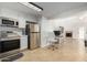 Modern kitchen with stainless steel appliances and white cabinets at 19820 N 13Th Ave # 226, Phoenix, AZ 85027