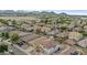 Aerial view of the house and surrounding neighborhood at 896 E Dust Devil Cir, San Tan Valley, AZ 85143