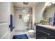 Updated bathroom with walk-in shower and modern vanity at 19202 N Signal Butte Cir, Sun City, AZ 85373