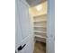 Spacious pantry with ample shelving at 19202 N Signal Butte Cir, Sun City, AZ 85373