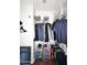 Spacious walk-in closet with ample shelving and hanging rods at 4306 E Tyson St, Gilbert, AZ 85295