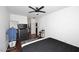 Bedroom with king-size bed, ceiling fan, and ample closet space at 4306 E Tyson St, Gilbert, AZ 85295