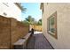 Small backyard with brick patio, grill, and storage at 4306 E Tyson St, Gilbert, AZ 85295