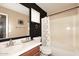 Clean bathroom with a tub, shower, and a modern vanity at 4306 E Tyson St, Gilbert, AZ 85295