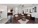 Open living room with sectional sofa and hardwood floors at 4306 E Tyson St, Gilbert, AZ 85295