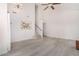 Spacious living room with vaulted ceiling, hardwood floors and staircase at 10654 E Forge Ave, Mesa, AZ 85208