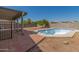 Backyard with a private pool and covered patio at 10654 E Forge Ave, Mesa, AZ 85208