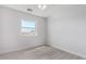 Simple bedroom with light walls and wood-look flooring at 10654 E Forge Ave, Mesa, AZ 85208