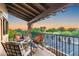Relaxing patio with seating area and golf course views at 23006 N 86Th St, Scottsdale, AZ 85255