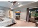 Spacious bedroom with sliding glass door to patio at 23006 N 86Th St, Scottsdale, AZ 85255