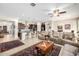 Open concept kitchen and living area with an island and seating at 1312 E Via Sicilia Rd, San Tan Valley, AZ 85140