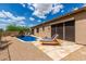 Blue rectangular pool with lounge chairs at 37143 N Greythorn Cir, Carefree, AZ 85377
