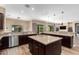 Modern kitchen features large island, stainless steel appliances, and ample counter space at 37143 N Greythorn Cir, Carefree, AZ 85377