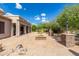Backyard patio with a fire pit and desert landscaping at 37143 N Greythorn Cir, Carefree, AZ 85377