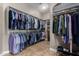 Large walk-in closet with ample hanging space and shelving at 37143 N Greythorn Cir, Carefree, AZ 85377