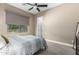 Comfortable bedroom with carpeted floors and a ceiling fan at 37143 N Greythorn Cir, Carefree, AZ 85377