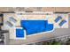 An elevated view of a refreshing blue pool with a spa and lounge chairs at 37143 N Greythorn Cir, Carefree, AZ 85377