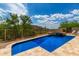 Luxury pool and spa with mountain views and lounge chairs at 37143 N Greythorn Cir, Carefree, AZ 85377