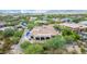 Aerial view of a luxury home with a private pool and lush landscaping in a desert setting at 37143 N Greythorn Cir, Carefree, AZ 85377