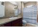 Clean bathroom with a shower/tub combo and updated vanity at 37143 N Greythorn Cir, Carefree, AZ 85377