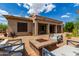 Fire pit and seating area in the backyard at 37143 N Greythorn Cir, Carefree, AZ 85377