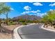 Curved road leading to a house with mountain views at 37143 N Greythorn Cir, Carefree, AZ 85377