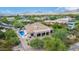 Aerial view of a luxurious house with a pool and a mountain backdrop at 37143 N Greythorn Cir, Carefree, AZ 85377