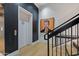 Modern stairwell with metal railings and a large piece of artwork at 2017 N 1St Ave, Phoenix, AZ 85003