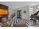 Stunning entryway with a grand staircase, black and white floor, and large double doors at 2017 N 1St Ave, Phoenix, AZ 85003
