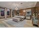 Primary bedroom with a king-size bed, and large windows at 2017 N 1St Ave, Phoenix, AZ 85003