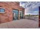Spacious rooftop terrace with city views and brick detailing at 2017 N 1St Ave, Phoenix, AZ 85003