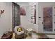 Cozy sitting area with a ukulele and large windows at 2017 N 1St Ave, Phoenix, AZ 85003