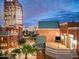 Night view of building exterior, showcasing a rooftop deck at 2017 N 1St Ave, Phoenix, AZ 85003