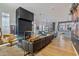 Open concept living area featuring a modern fireplace and hardwood floors at 2017 N 1St Ave, Phoenix, AZ 85003