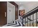 Modern stairwell with black and white chevron flooring at 2017 N 1St Ave, Phoenix, AZ 85003